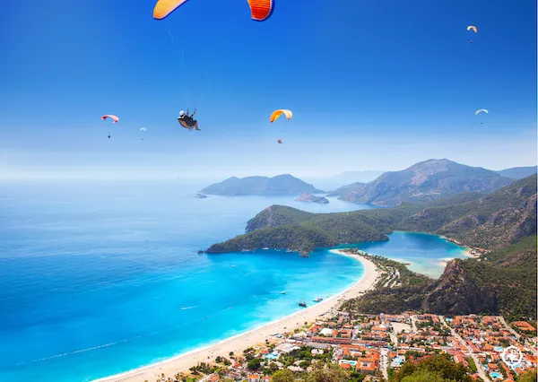 Paragliding over the blue lagoon in Oludeniz during Aegean Flow experience