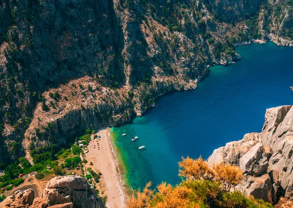 Hidden beach between cliffs along the Aegean coast during Aegean Flow itinerary