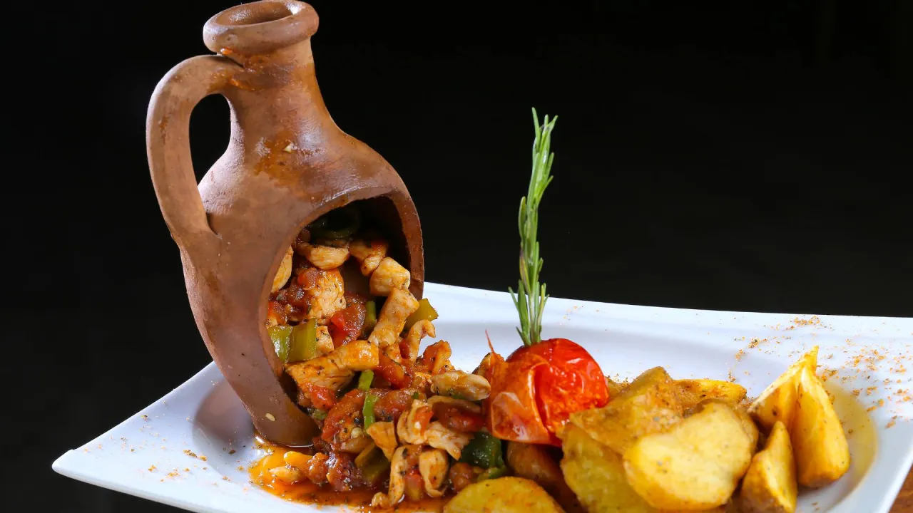 Traditional Turkish cuisine served in clay pot during Antalya Cappadocia journey