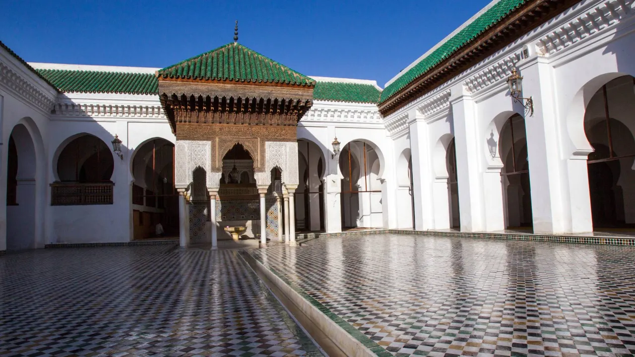 Historic Islamic courtyard with mosaic tiles in Fez, Morocco