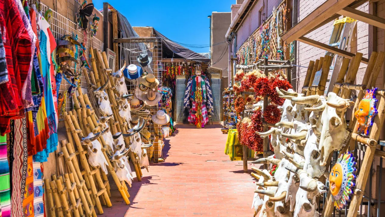 Colorful souk street in the medina of Fez with local artisans